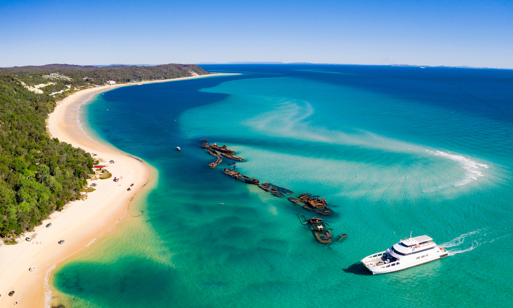 A birdseye view of a Moreton Island and the iconic landmark submerged shipwreck